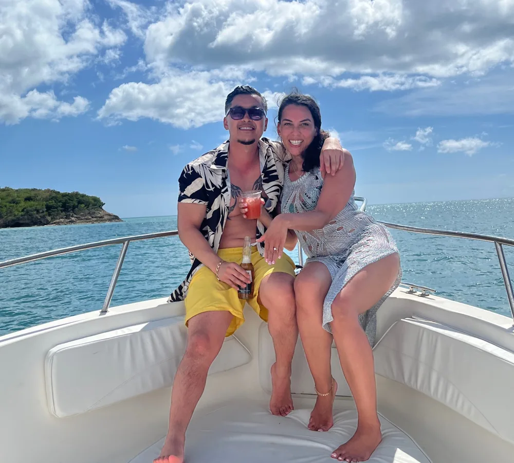 Charlene and Van enjoying a boat trip in the Caribbean