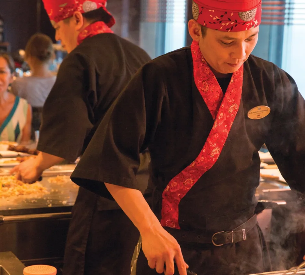 Norwegian Cruise Line Teppanyaki chef cooking onboard